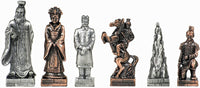 6 pewter chessmen.