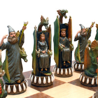 The king and queen dragon chessmen on the other side of the board.