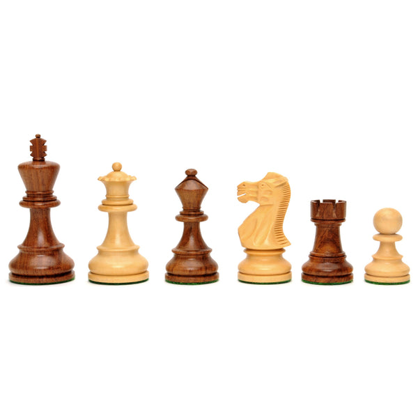 Wooden English chessmen weighted and hand polished.
