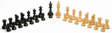 Black stained and natural wood chess pieces.