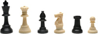 6 black and cream staunton chess pieces.