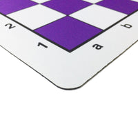 Rounded corner of purple mousepad chessboard.