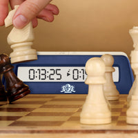 Image of digital clock being used in chess match.
