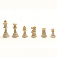 6 white Staunton chess pieces.