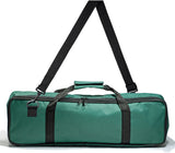 Green travel canvas bag with carrying handle and shoulder strap.