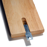 Hidden storage compartment for pegs underneath board.