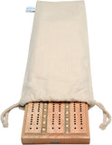 Cribbage board partially sitting out of cloth canvas storage bag with drawstring.