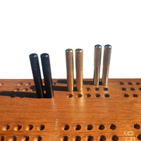  Set of 6 pegs on cribbage board.