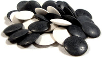 Pile of black and white GO stones.