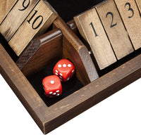 Zoomed in picture of red dice in corner of box.