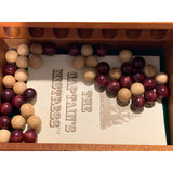 Wooden balls used to okay 4 in a row game.