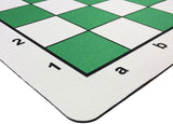 Rounded corner of green mousepad chess mat.