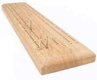 Full view of Cribbage board with metal pegs in board.