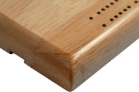Zoomed in picture of corner of Cribbage board.
