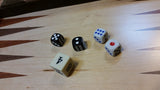 5 different dice for the 3 games.