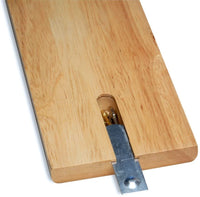 Hidden storage on back of board for metal pegs.