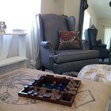 Shut The Box zoomed out being played on table in living room.